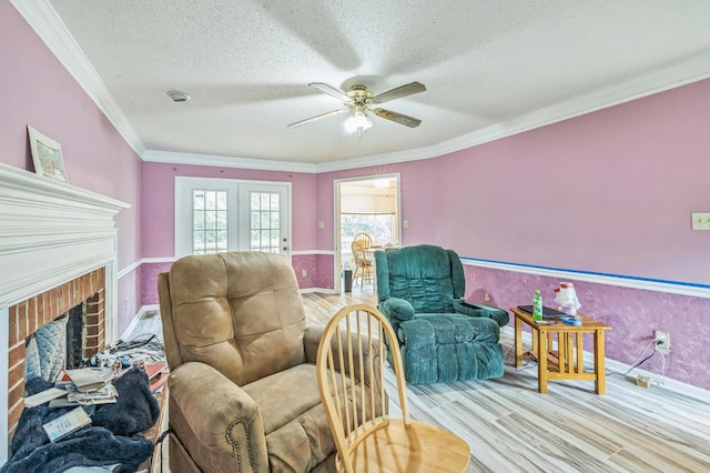 284 Mount Folly Rd, Augusta, GA 30907 - sitting room featuring a ceiling fan, baseboards, wood finished floors, ornamental molding, and a fireplace