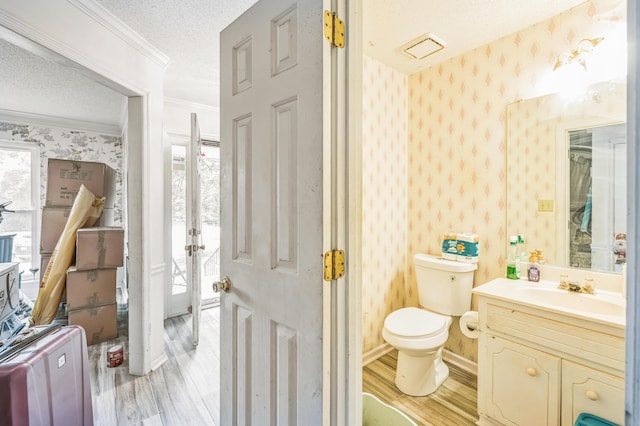 284 Mount Folly Rd, Augusta, GA 30907 - bathroom featuring wallpapered walls, wood finished floors, crown molding, a textured ceiling, and vanity