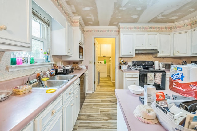 284 Mount Folly Rd, Augusta, GA 30907 - kitchen featuring under cabinet range hood, electric range, a sink, light wood-style floors, and white cabinetry