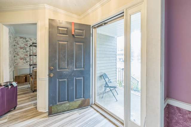 284 Mount Folly Rd, Augusta, GA 30907 - foyer featuring wainscoting, plenty of natural light, crown molding, a textured ceiling, and wood finished floors