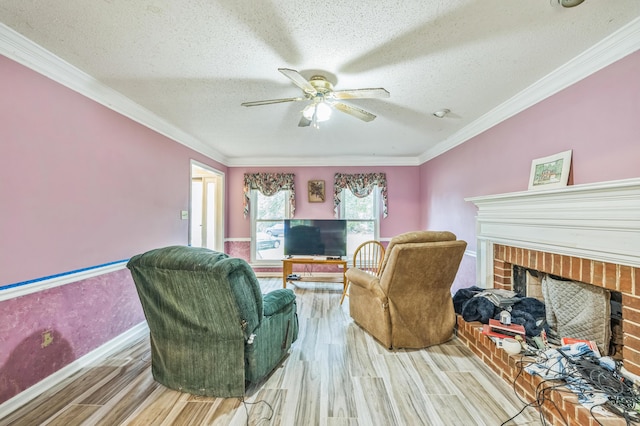 284 Mount Folly Rd, Augusta, GA 30907 - living area with a fireplace, wood finished floors, a ceiling fan, a textured ceiling, and ornamental molding