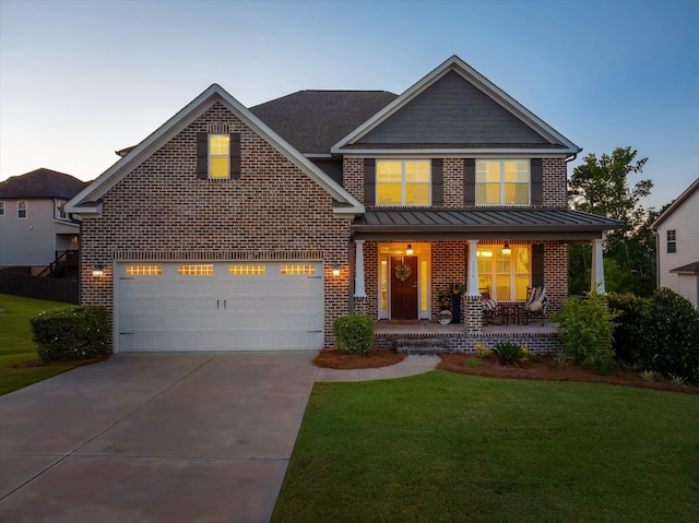 1206 Arcilla Pt, Martinez, GA 30907 - view of front of home featuring brick siding, covered porch, concrete driveway, and a lawn