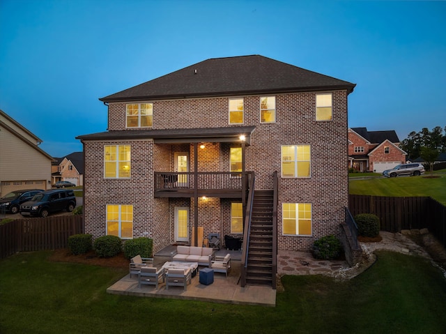 1206 Arcilla Pt, Martinez, GA 30907 - rear view of property featuring outdoor lounge area, brick siding, and a patio area