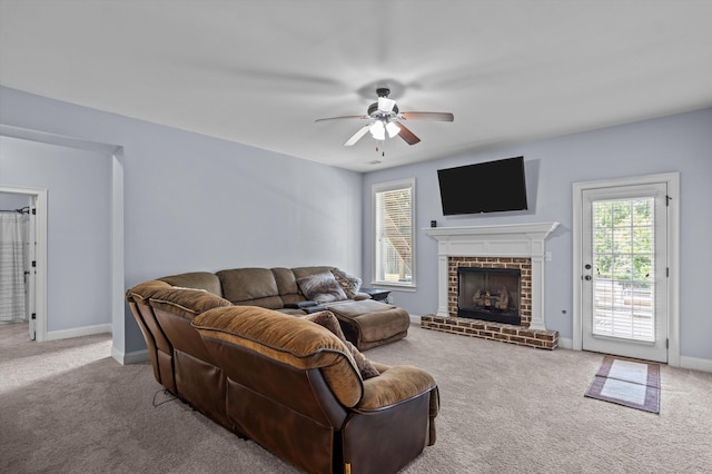 1206 Arcilla Pt, Martinez, GA 30907 - carpeted living area featuring ceiling fan, a brick fireplace, and baseboards