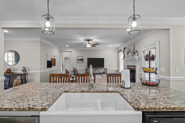1206 Arcilla Pt, Martinez, GA 30907 - kitchen with a sink, open floor plan, a ceiling fan, light stone countertops, and recessed lighting