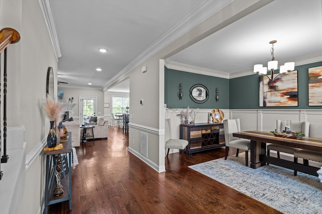 1206 Arcilla Pt, Martinez, GA 30907 - entrance foyer with a chandelier, wood finished floors, crown molding, recessed lighting, and wainscoting