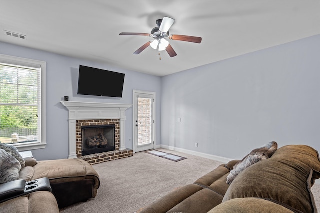 1206 Arcilla Pt, Martinez, GA 30907 - living area with carpet floors, a ceiling fan, a fireplace, and baseboards