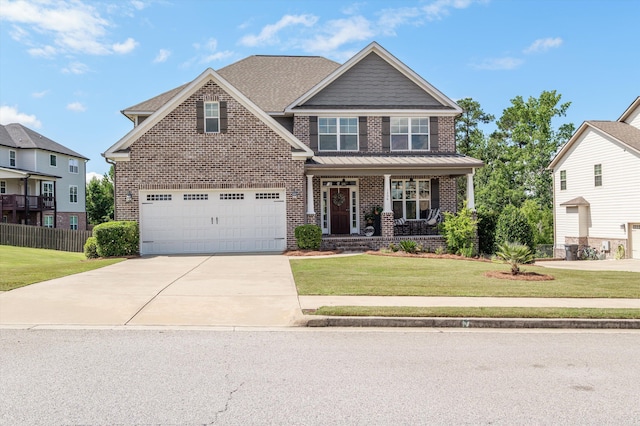 1206 Arcilla Pt, Martinez, GA 30907 - craftsman inspired home featuring brick siding, covered porch, driveway, and a garage
