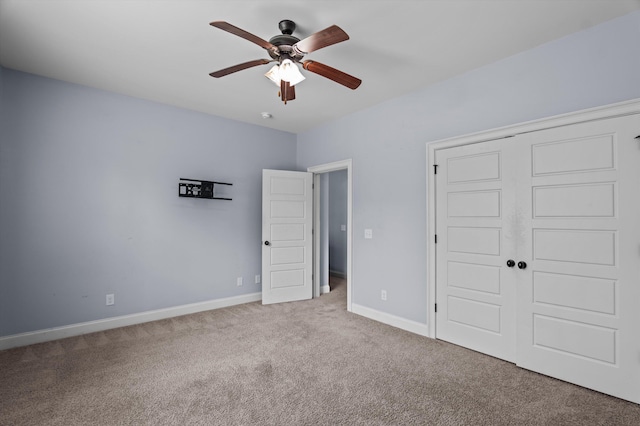 1206 Arcilla Pt, Martinez, GA 30907 - unfurnished bedroom featuring carpet, a closet, baseboards, and ceiling fan