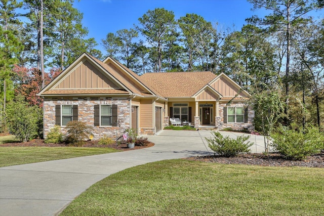 106 Bereau Dr, Mccormick, SC 29835 - craftsman house with stone siding, board and batten siding, concrete driveway, a front lawn, and a shingled roof