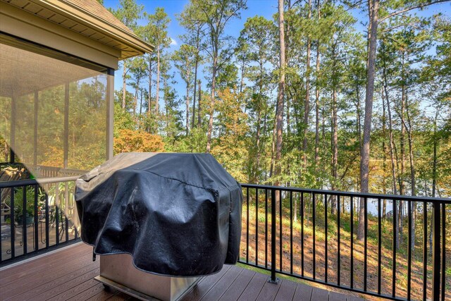 wooden deck with grilling area