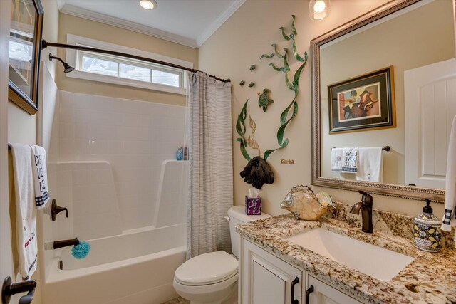 full bathroom with vanity, toilet, crown molding, and shower / tub combo with curtain