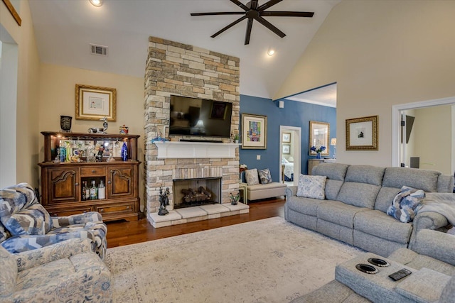 106 Bereau Dr, Mccormick, SC 29835 - living area featuring ceiling fan, wood finished floors, a stone fireplace, and high vaulted ceiling