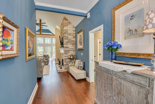 106 Bereau Dr, Mccormick, SC 29835 - corridor featuring dark wood finished floors, baseboards, lofted ceiling, and crown molding