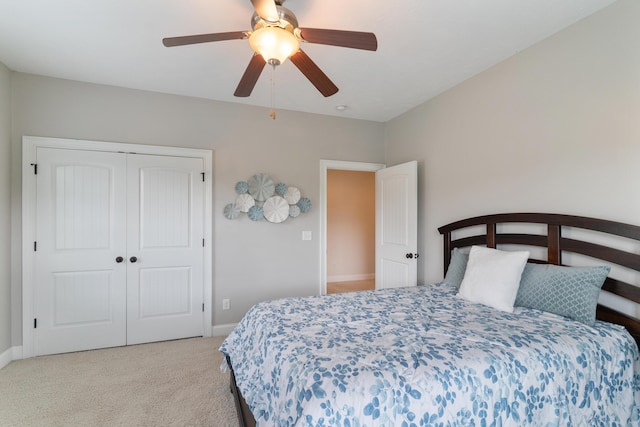 2224 Fothergill Dr, Evans, GA 30809 - carpeted bedroom with a closet, baseboards, and a ceiling fan