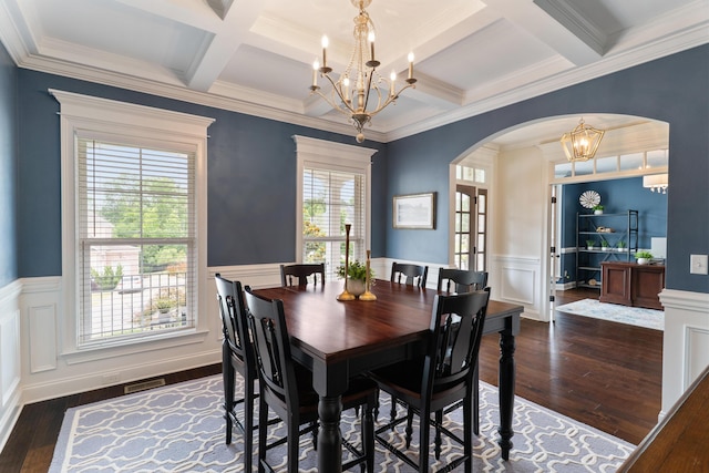 2224 Fothergill Dr, Evans, GA 30809 - dining room featuring a chandelier, arched walkways, coffered ceiling, dark wood-type flooring, and beam ceiling