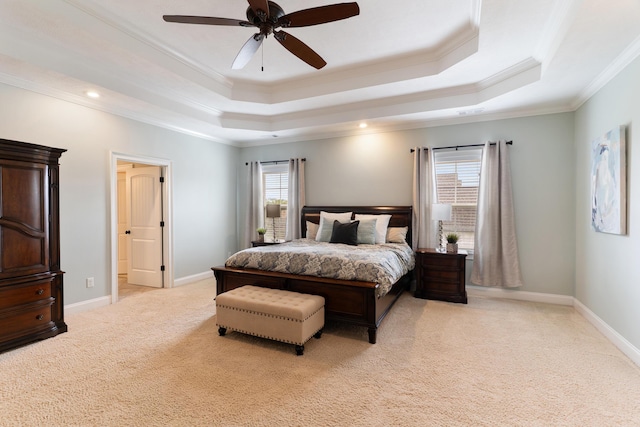 2224 Fothergill Dr, Evans, GA 30809 - bedroom featuring a tray ceiling, crown molding, light carpet, ceiling fan, and baseboards