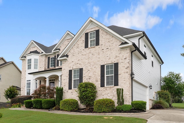 2224 Fothergill Dr, Evans, GA 30809 - traditional home featuring an attached garage, brick siding, and driveway