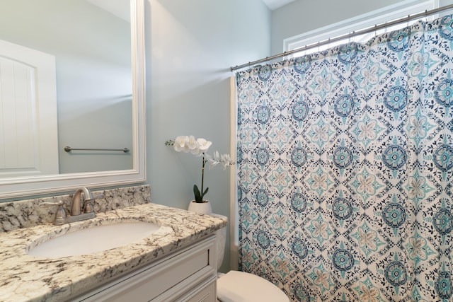 2224 Fothergill Dr, Evans, GA 30809 - bathroom featuring vanity, a shower with shower curtain, and toilet