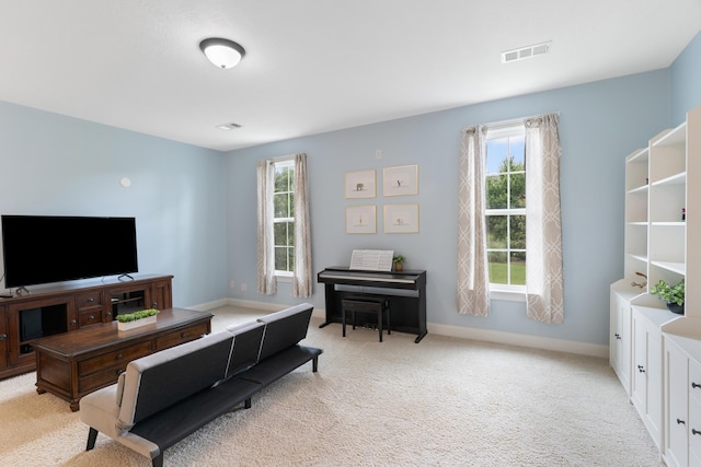 2224 Fothergill Dr, Evans, GA 30809 - living area featuring plenty of natural light, light colored carpet, and baseboards