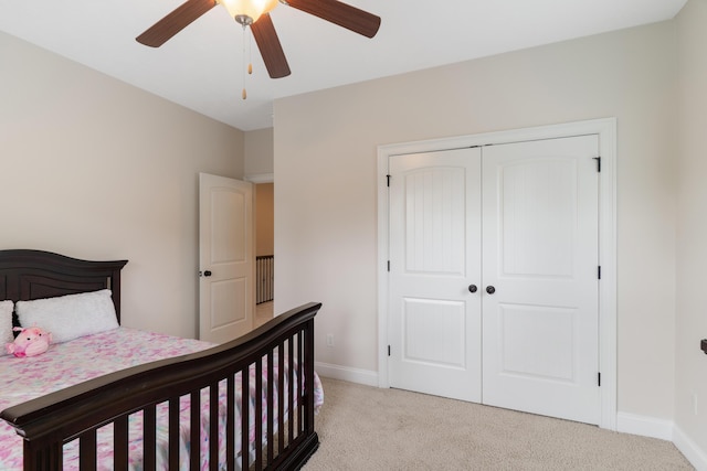 2224 Fothergill Dr, Evans, GA 30809 - bedroom featuring light colored carpet, baseboards, a closet, and ceiling fan