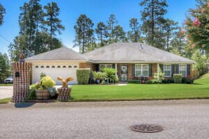 1494 Brookstone Rd, Hephzibah, GA 30815 - single story home featuring an attached garage, a front lawn, and driveway
