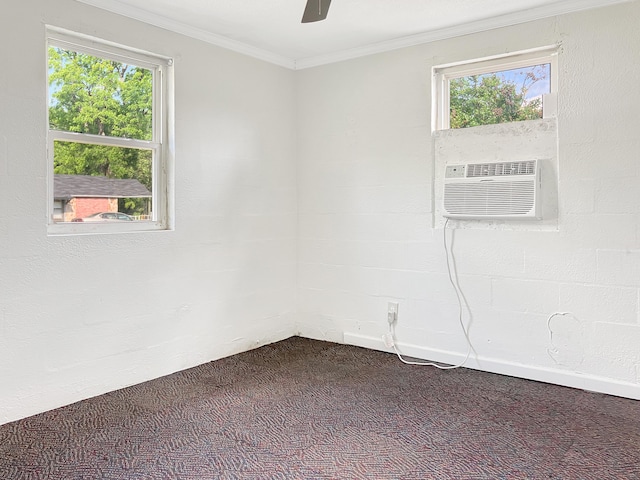 802 Yellow Town Rd, Waynesboro, GA 30830 - empty room with dark carpet, healthy amount of natural light, ornamental molding, a wall unit AC, and a ceiling fan