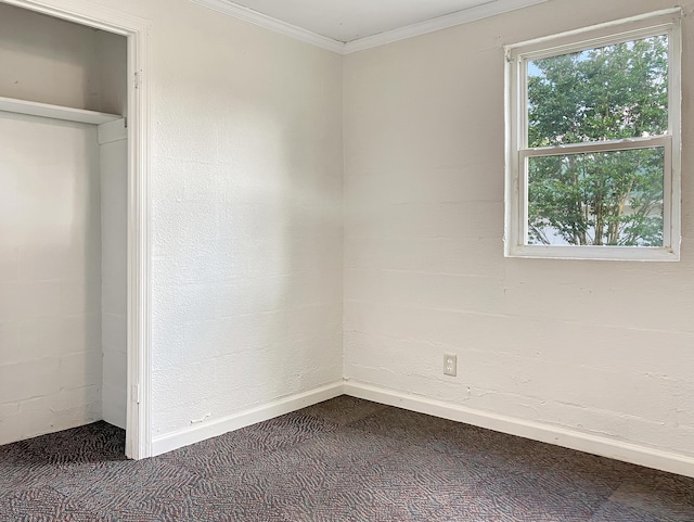 802 Yellow Town Rd, Waynesboro, GA 30830 - unfurnished bedroom featuring dark carpet, ornamental molding, and baseboards