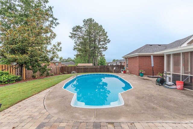 2108 Glenn Fls, Grovetown, GA 30813 - view of swimming pool with a patio and a sunroom