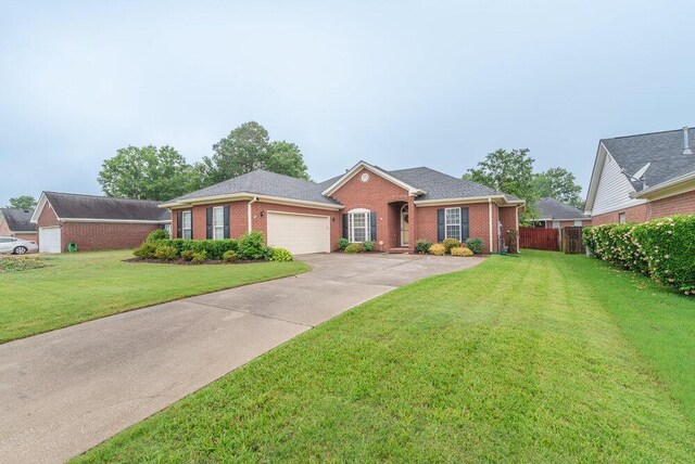 2108 Glenn Fls, Grovetown, GA 30813 - ranch-style home featuring brick siding, an attached garage, and driveway
