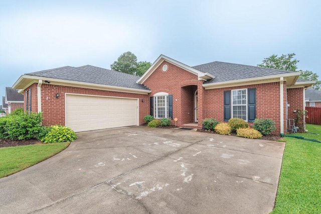2108 Glenn Fls, Grovetown, GA 30813 - view of front of property featuring brick siding, roof with shingles, an attached garage, driveway, and a front lawn