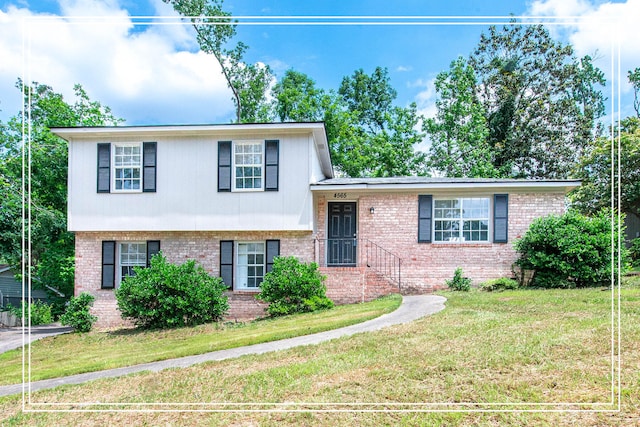 4565 Rockdale Ct, Martinez, GA 30907 - tri-level home featuring brick siding and a front yard