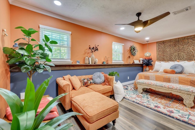 2206 Sandra Ct, Augusta, GA 30906 - bedroom with ornamental molding, multiple windows, wood finished floors, recessed lighting, and ceiling fan