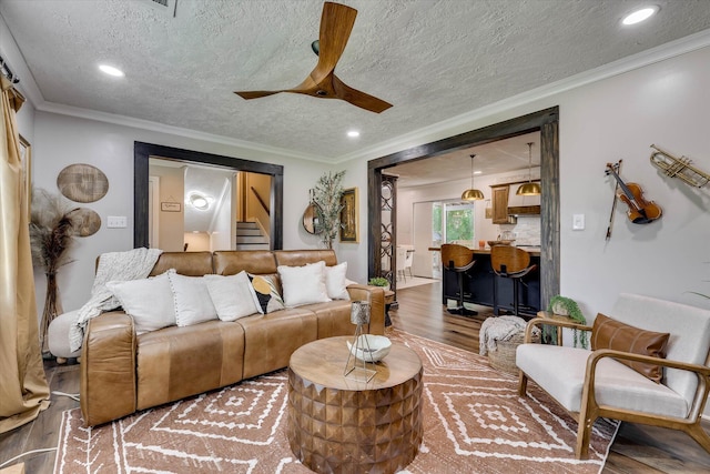 2206 Sandra Ct, Augusta, GA 30906 - living room with wood finished floors, a textured ceiling, stairs, ceiling fan, and recessed lighting
