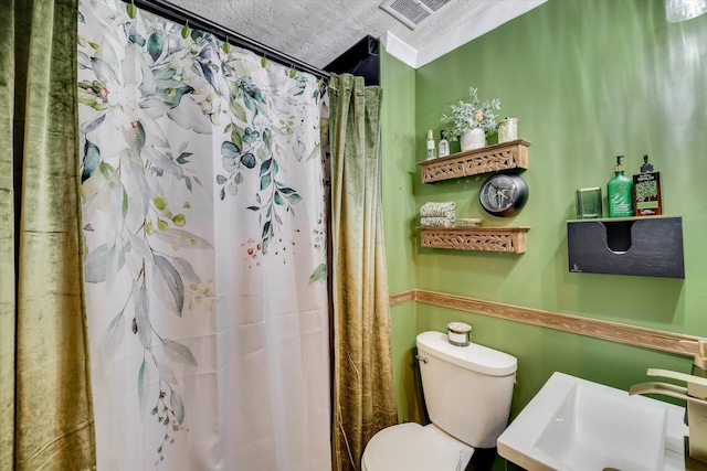 2206 Sandra Ct, Augusta, GA 30906 - full bath featuring a sink, toilet, and a shower with curtain