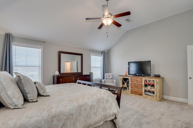 bedroom with visible vents, carpet floors, baseboards, ceiling fan, and vaulted ceiling