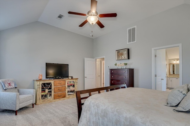 bedroom featuring visible vents, connected bathroom, ceiling fan, carpet floors, and high vaulted ceiling