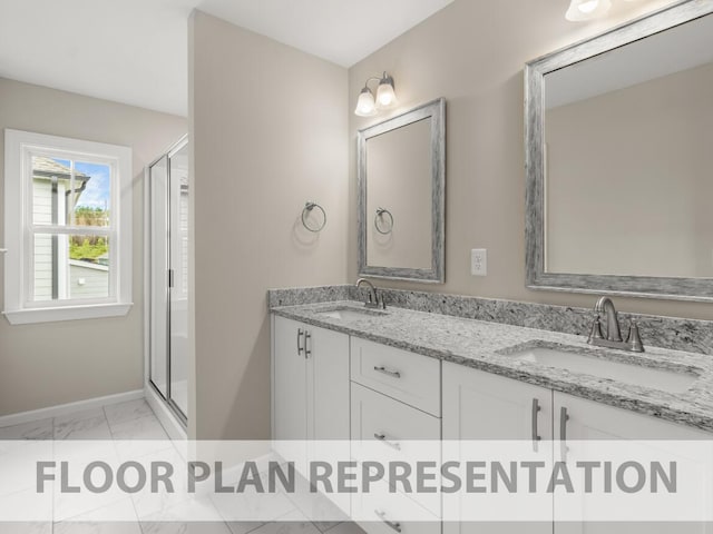 WD247 Helen Dr, North Augusta, SC 29860 - full bathroom featuring marble look tile flooring, double vanity, a shower stall, and baseboards