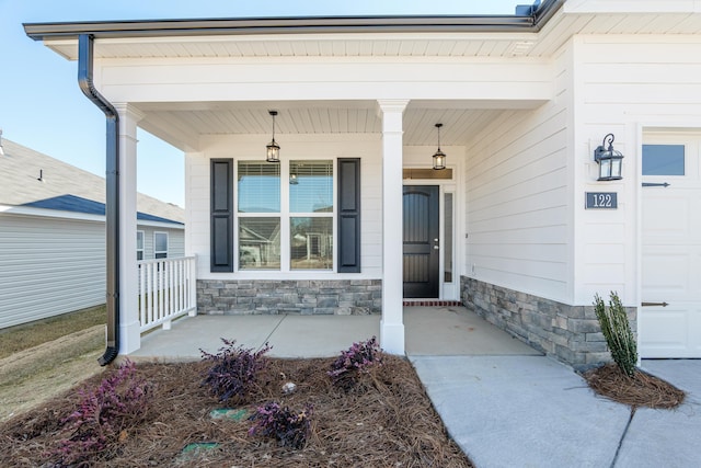 entrance to property with covered porch