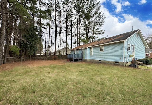 view of yard featuring a wooden deck