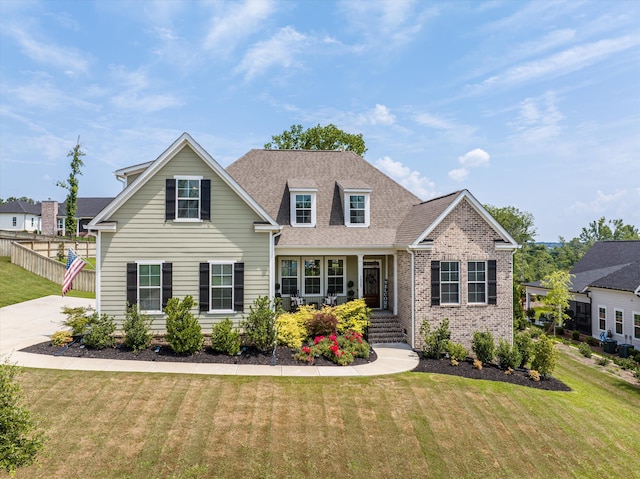 1037 Bartram Rdg, Evans, GA 30809 - traditional-style home featuring covered porch, brick siding, and a shingled roof