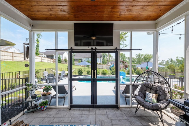 1037 Bartram Rdg, Evans, GA 30809 - sunroom / solarium featuring wood ceiling, ornamental molding, and stone tile flooring