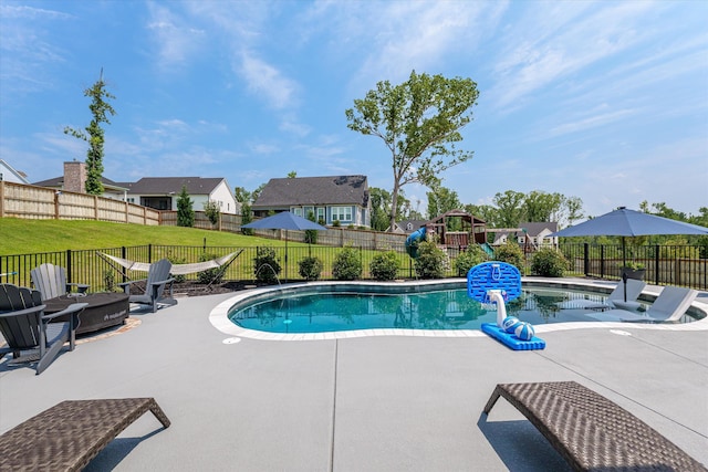 1037 Bartram Rdg, Evans, GA 30809 - view of swimming pool with an outdoor fire pit, a playground, a patio area, a fenced backyard, and a residential view