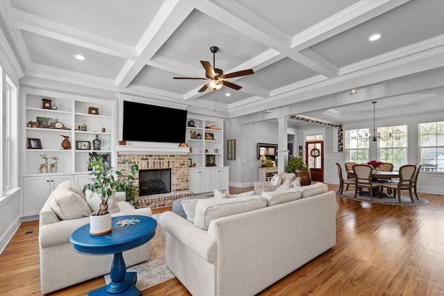 1037 Bartram Rdg, Evans, GA 30809 - living room with a ceiling fan, wood finished floors, coffered ceiling, a brick fireplace, and ornamental molding