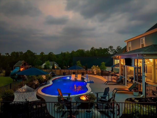 1037 Bartram Rdg, Evans, GA 30809 - view of pool with a fire pit, a patio, and a fenced backyard