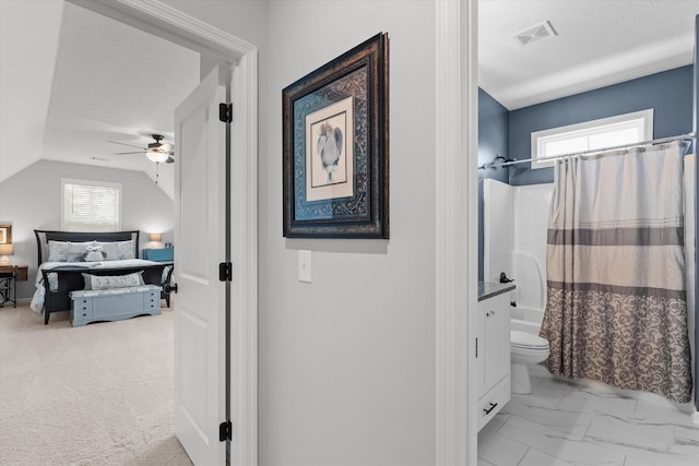 1037 Bartram Rdg, Evans, GA 30809 - full bath with a ceiling fan, lofted ceiling, shower / bathtub combination with curtain, and marble finish flooring