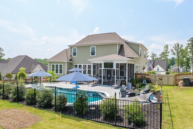 1037 Bartram Rdg, Evans, GA 30809 - rear view of house featuring a sunroom, a patio area, a fenced backyard, a shingled roof, and a gazebo