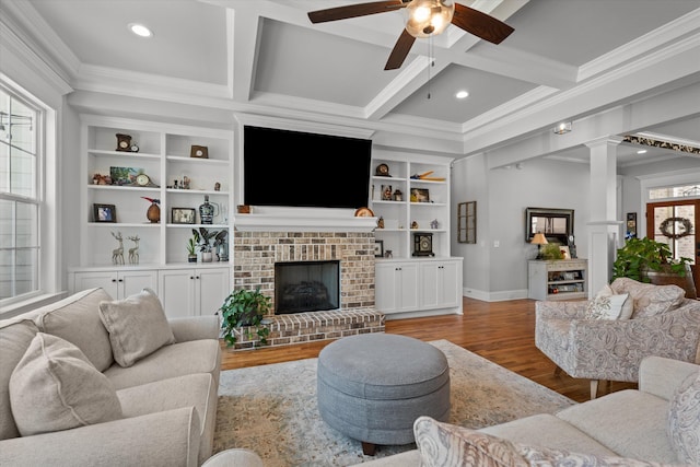 1037 Bartram Rdg, Evans, GA 30809 - living room with crown molding, a ceiling fan, light wood finished floors, a brick fireplace, and coffered ceiling