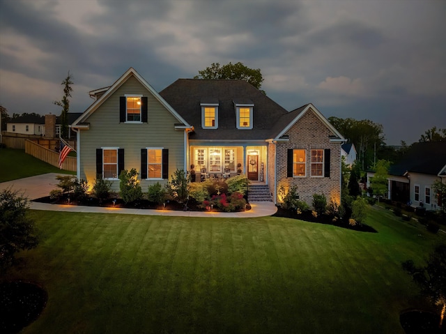 1037 Bartram Rdg, Evans, GA 30809 - view of front facade featuring covered porch and brick siding