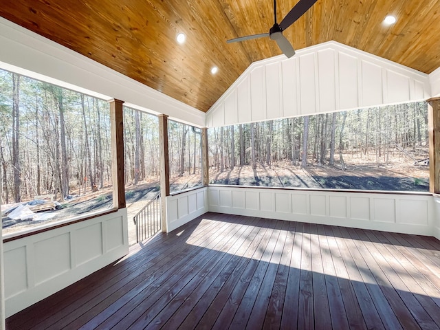 unfurnished sunroom featuring lofted ceiling, ceiling fan, and wood ceiling